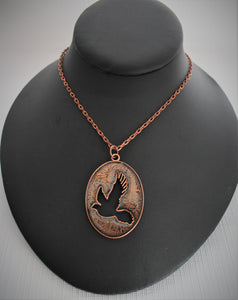 Oval Pendant with Dove
